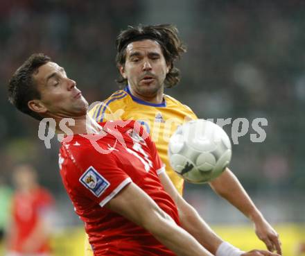 Fussball WM Qualifikationsspiel. Oessterreich gegen Rumaenien. Stefan Maierhofer, (Oesterreich), Cosmin Marius Contra  (Rumarnien). Hypo Group Arena, Klagenfurt, am 1.4. 2009.
Foto: Kuess

---
pressefotos, pressefotografie, kuess, qs, qspictures, sport, bild, bilder, bilddatenbank