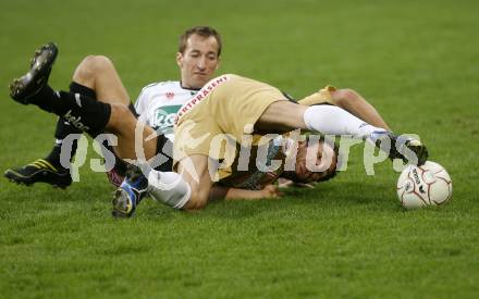 Fussball. Tipp3-Bundesliga. SK Austria Kelag Kaernten gegen LASK Linz. Manuel Ortlechner, (Austria Kaernten), Roman Wallner (Linz). Klagenfurt, 11.4.2009. 
Foto: Kuess

---
pressefotos, pressefotografie, kuess, qs, qspictures, sport, bild, bilder, bilddatenbank