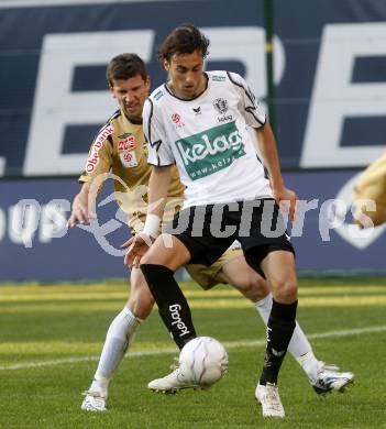 Fussball. Tipp3-Bundesliga. SK Austria Kelag Kaernten gegen LASK Linz. Atdeh Nuhiu, (Austria Kaernten), Davorin Kablar (Linz). Klagenfurt, 11.4.2009. 
Foto: Kuess

---
pressefotos, pressefotografie, kuess, qs, qspictures, sport, bild, bilder, bilddatenbank