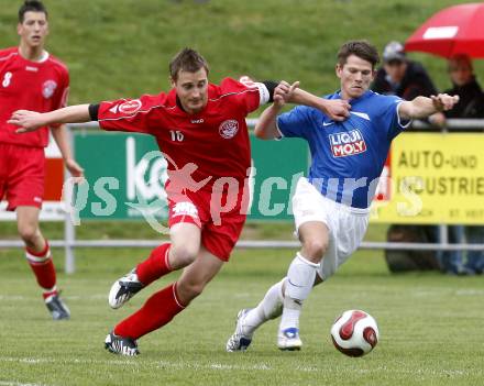 Fussball. Unterliga Ost. Koettmannsdorf gegen Ludmannsdorf. Hubmann Guenther (Koettmannsdorf), Modritsch Stefan  (Ludmannsdorf). Koettmannsdorf, 19.4.2009. 
Foto: Kuess

---
pressefotos, pressefotografie, kuess, qs, qspictures, sport, bild, bilder, bilddatenbank