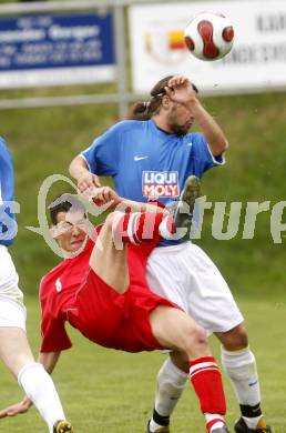 Fussball. Unterliga Ost. Koettmannsdorf gegen Ludmannsdorf. Kogler Florian (Koettmannsdorf), Muenzer David (Ludmannsdorf). Koettmannsdorf, 19.4.2009. 
Foto: Kuess

---
pressefotos, pressefotografie, kuess, qs, qspictures, sport, bild, bilder, bilddatenbank