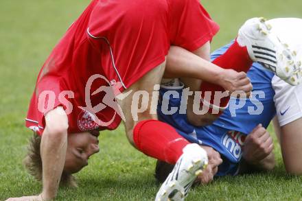 Fussball. Unterliga Ost. Koettmannsdorf gegen Ludmannsdorf. Frank Mario  (Koettmannsdorf), Glantschnig Christian (Ludmannsdorf). Koettmannsdorf, 19.4.2009. 
Foto: Kuess

---
pressefotos, pressefotografie, kuess, qs, qspictures, sport, bild, bilder, bilddatenbank