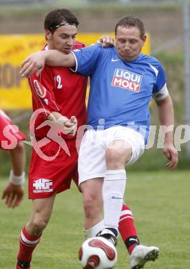 Fussball. Unterliga Ost. Koettmannsdorf gegen Ludmannsdorf. Frank Mario  (Koettmannsdorf), Kozel Jürgen (Ludmannsdorf). Koettmannsdorf, 19.4.2009. 
Foto: Kuess

---
pressefotos, pressefotografie, kuess, qs, qspictures, sport, bild, bilder, bilddatenbank