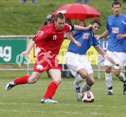 Fussball. Unterliga Ost. Koettmannsdorf gegen Ludmannsdorf. Hubmann Guenther (Koettmannsdorf), Modritsch Stefan  (Ludmannsdorf). Koettmannsdorf, 19.4.2009. 
Foto: Kuess

---
pressefotos, pressefotografie, kuess, qs, qspictures, sport, bild, bilder, bilddatenbank