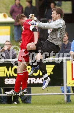 Fussball. Unterliga Ost. Koettmannsdorf gegen Ludmannsdorf. Zagorz Alexander (Koettmannsdorf), Modritsch Stefan  (Ludmannsdorf). Koettmannsdorf, 19.4.2009. 
Foto: Kuess

---
pressefotos, pressefotografie, kuess, qs, qspictures, sport, bild, bilder, bilddatenbank