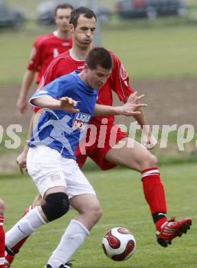 Fussball. Unterliga Ost. Koettmannsdorf gegen Ludmannsdorf. Krall Mario (Koettmannsdorf), Modritsch Wolfgang (Ludmannsdorf). Koettmannsdorf, 19.4.2009. 
Foto: Kuess

---
pressefotos, pressefotografie, kuess, qs, qspictures, sport, bild, bilder, bilddatenbank