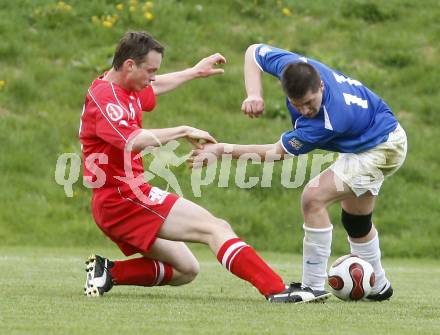 Fussball. Unterliga Ost. Koettmannsdorf gegen Ludmannsdorf. Krall Mario (Koettmannsdorf), Weber Roman (Ludmannsdorf). Koettmannsdorf, 19.4.2009. 
Foto: Kuess

---
pressefotos, pressefotografie, kuess, qs, qspictures, sport, bild, bilder, bilddatenbank