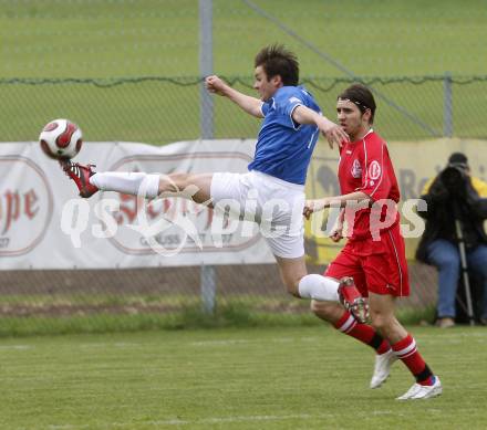 Fussball. Unterliga Ost. Koettmannsdorf gegen Ludmannsdorf. Krall Mario (Koettmannsdorf), Kozel Juergen (Ludmannsdorf). Koettmannsdorf, 19.4.2009. 
Foto: Kuess

---
pressefotos, pressefotografie, kuess, qs, qspictures, sport, bild, bilder, bilddatenbank