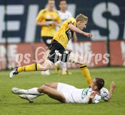 Fussball. Tipp3-Bundesliga. SK Austria Kelag Kaernten gegen SCR Altach. Oliver Pusztai, (Austria Kaernten), Matthias Koch (Altach). Klagenfurt, 25.4.2009. 
Foto: Kuess

---
pressefotos, pressefotografie, kuess, qs, qspictures, sport, bild, bilder, bilddatenbank