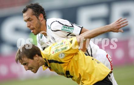 Fussball. Tipp3-Bundesliga. SK Austria Kelag Kaernten gegen SCR Altach. Christian Prawda, (Austria Kaernten), Tomas Jun (Altach). Klagenfurt, 25.4.2009. 
Foto: Kuess

---
pressefotos, pressefotografie, kuess, qs, qspictures, sport, bild, bilder, bilddatenbank