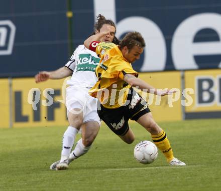 Fussball. Tipp3-Bundesliga. SK Austria Kelag Kaernten gegen SCR Altach. Wolfgang Mair, (Austria Kaernten), Kai Walter Schoppitsch (Altach). Klagenfurt, 25.4.2009. 
Foto: Kuess

---
pressefotos, pressefotografie, kuess, qs, qspictures, sport, bild, bilder, bilddatenbank