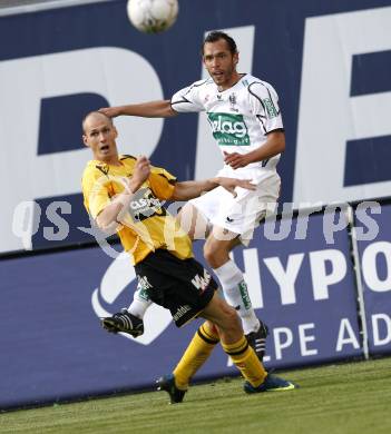 Fussball. Tipp3-Bundesliga. SK Austria Kelag Kaernten gegen SCR Altach. Christian Prawda, (Austria Kaernten), Dennis Mimm (Altach). Klagenfurt, 25.4.2009. 
Foto: Kuess

---
pressefotos, pressefotografie, kuess, qs, qspictures, sport, bild, bilder, bilddatenbank