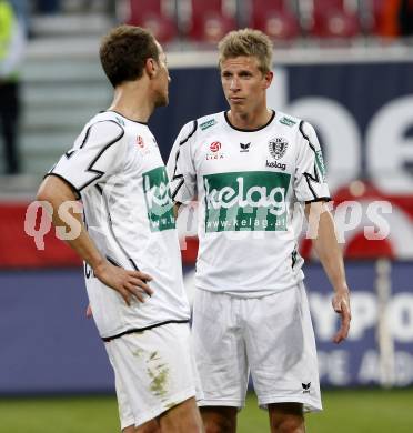 Fussball. Tipp3-Bundesliga. SK Austria Kelag Kaernten gegen SCR Altach. Manuel Ortlechner, Thomas Hinum (Austria Kaernten). Klagenfurt, 25.4.2009. 
Foto: Kuess

---
pressefotos, pressefotografie, kuess, qs, qspictures, sport, bild, bilder, bilddatenbank