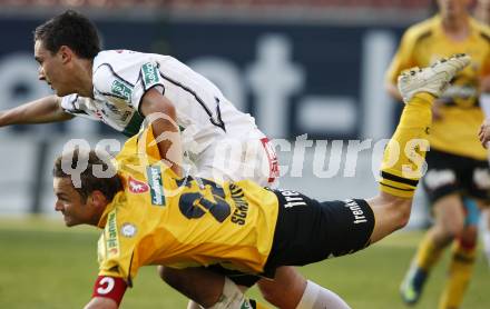 Fussball. Tipp3-Bundesliga. SK Austria Kelag Kaernten gegen SCR Altach. Markus Pink, (Austria Kaernten), Kai Walter Schoppitsch (Altach). Klagenfurt, 25.4.2009. 
Foto: Kuess

---
pressefotos, pressefotografie, kuess, qs, qspictures, sport, bild, bilder, bilddatenbank