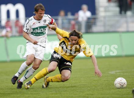 Fussball. Tipp3-Bundesliga. SK Austria Kelag Kaernten gegen SCR Altach. Thomas Riedl, (Austria Kaernten), Srdjan Radonjic (Altach). Klagenfurt, 25.4.2009. 
Foto: Kuess

---
pressefotos, pressefotografie, kuess, qs, qspictures, sport, bild, bilder, bilddatenbank