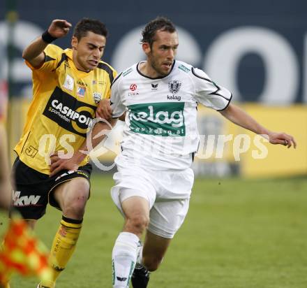 Fussball. Tipp3-Bundesliga. SK Austria Kelag Kaernten gegen SCR Altach. Christian Prawda, (Austria Kaernten), Dursun Karatay (Altach). Klagenfurt, 25.4.2009. 
Foto: Kuess

---
pressefotos, pressefotografie, kuess, qs, qspictures, sport, bild, bilder, bilddatenbank