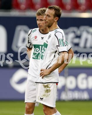 Fussball. Tipp3-Bundesliga. SK Austria Kelag Kaernten gegen SCR Altach. Manuel Ortlechner, Thomas Hinum (Austria Kaernten). Klagenfurt, 25.4.2009. 
Foto: Kuess

---
pressefotos, pressefotografie, kuess, qs, qspictures, sport, bild, bilder, bilddatenbank