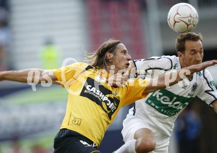 Fussball. Tipp3-Bundesliga. SK Austria Kelag Kaernten gegen SCR Altach. Manuel Ortlechner, (Austria Kaernten),  Srdjan Radonjic (Altach). Klagenfurt, 25.4.2009. 
Foto: Kuess

---
pressefotos, pressefotografie, kuess, qs, qspictures, sport, bild, bilder, bilddatenbank