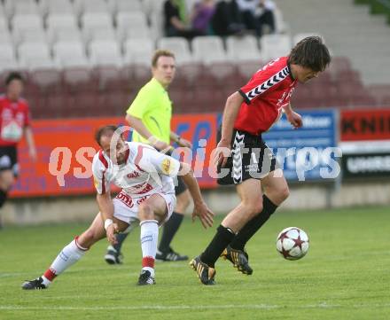 Fussball. Regionalliga. SV Feldkirchen gegen GAK. Robert Micheu (Feldkirchen), Robert Fruestuek (GAK). Feldkirchen, 8.5.2009. 
Foto: Kuess 

---
pressefotos, pressefotografie, kuess, qs, qspictures, sport, bild, bilder, bilddatenbank