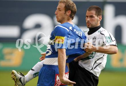 Fussball. Tipp3-Bundesliga. SK Austria Kelag Kaernten  gegen Kapfenberger SV. Oliver Pusztai,  (Austria Kaernten), Arno Paul Kozelsky (Kapfenberg). Klagenfurt, 9.5.2009. 
Foto: Kuess

---
pressefotos, pressefotografie, kuess, qs, qspictures, sport, bild, bilder, bilddatenbank