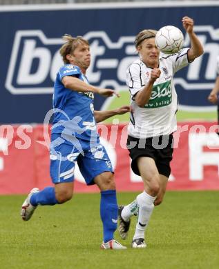 Fussball. Tipp3-Bundesliga. SK Austria Kelag Kaernten  gegen Kapfenberger SV. Stefan Hierlaender, (Austria Kaernten),  Patrik Siegl (Kapfenberg). Klagenfurt, 9.5.2009. 
Foto: Kuess

---
pressefotos, pressefotografie, kuess, qs, qspictures, sport, bild, bilder, bilddatenbank