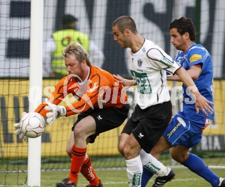 Fussball. Tipp3-Bundesliga. SK Austria Kelag Kaernten  gegen Kapfenberger SV. Andreas Schranz, (Austria Kaernten), Marco Salvatore (Kapfenberg). Klagenfurt, 9.5.2009. 
Foto: Kuess

---
pressefotos, pressefotografie, kuess, qs, qspictures, sport, bild, bilder, bilddatenbank