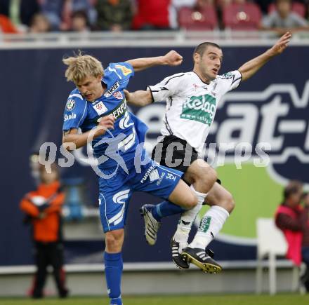 Fussball. Tipp3-Bundesliga. SK Austria Kelag Kaernten  gegen Kapfenberger SV. Marco Salvatore, (Austria Kaernten), Markus Felfernig (Kapfenberg). Klagenfurt, 9.5.2009. 
Foto: Kuess

---
pressefotos, pressefotografie, kuess, qs, qspictures, sport, bild, bilder, bilddatenbank