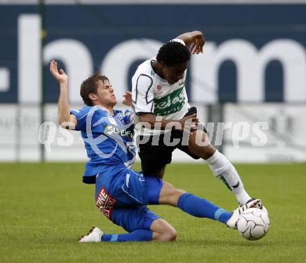 Fussball. Tipp3-Bundesliga. SK Austria Kelag Kaernten  gegen Kapfenberger SV. Sandro, (Austria Kaernten), Boris Huettenbrenner  (Kapfenberg). Klagenfurt, 9.5.2009. 
Foto: Kuess

---
pressefotos, pressefotografie, kuess, qs, qspictures, sport, bild, bilder, bilddatenbank