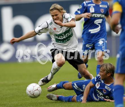 Fussball. Tipp3-Bundesliga. SK Austria Kelag Kaernten  gegen Kapfenberger SV. Stefan Hierlaender, (Austria Kaernten), David Senzar (Kapfenberg). Klagenfurt, 9.5.2009. 
Foto: Kuess

---
pressefotos, pressefotografie, kuess, qs, qspictures, sport, bild, bilder, bilddatenbank