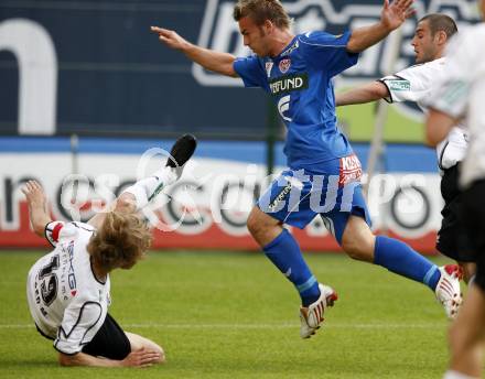 Fussball. Tipp3-Bundesliga. SK Austria Kelag Kaernten  gegen Kapfenberger SV. Manuel Weber, (Austria Kaernten), David Sencar (Kapfenberg). Klagenfurt, 9.5.2009. 
Foto: Kuess

---
pressefotos, pressefotografie, kuess, qs, qspictures, sport, bild, bilder, bilddatenbank