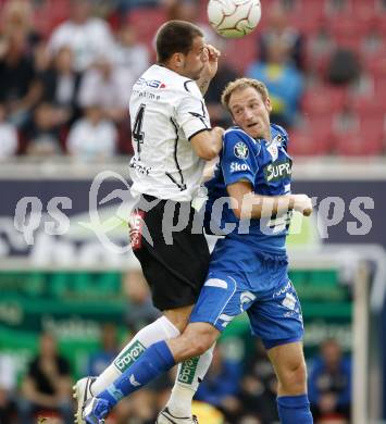 Fussball. Tipp3-Bundesliga. SK Austria Kelag Kaernten  gegen Kapfenberger SV. Over Pusztai, (Austria Kaernten), Arno Paul Kozelsky (Kapfenberg). Klagenfurt, 9.5.2009. 
Foto: Kuess

---
pressefotos, pressefotografie, kuess, qs, qspictures, sport, bild, bilder, bilddatenbank