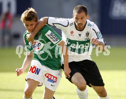 Fussball. Tipp3-Bundesliga. SK Austria Kelag Kaernten gegen SV Josko Ried. Oliver Pusztai, (Austria Kaernten), Philipp Huspek (Ried).  Klagenfurt, 21.5.2009. 
Foto: Kuess

---
pressefotos, pressefotografie, kuess, qs, qspictures, sport, bild, bilder, bilddatenbank