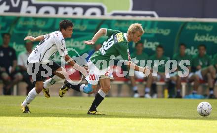 Fussball. Tipp3-Bundesliga. SK Austria Kelag Kaernten gegen SV Josko Ried. Zlatko Junuzovic (Kaernten), Peter Hackmair (Ried).  Klagenfurt, 21.5.2009. 
Foto: Kuess

---
pressefotos, pressefotografie, kuess, qs, qspictures, sport, bild, bilder, bilddatenbank