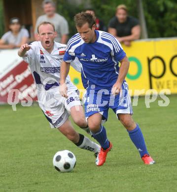 Fussball Regionalliga. SAK gegen FC St. Veit. Simon Sadjak (SAK), Martin Wakonig (St. Veit). Klagenfurt, am 6.6.2009.
Foto: Kuess
---
pressefotos, pressefotografie, kuess, qs, qspictures, sport, bild, bilder, bilddatenbank