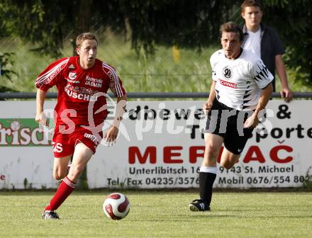 Fussball Unterliga Ost. ASKOE St. Michael/Bleiburg gegen SK Kuehnsdorf. Dominik Malej (St. Michael), Gerald Erich Rebernig (Kuehnsdorf). St. Michael, am 12.6.2009.
Foto: Kuess
---
pressefotos, pressefotografie, kuess, qs, qspictures, sport, bild, bilder, bilddatenbank