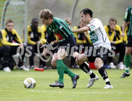 Fussball Bundesliga. Testspiel. SK Austria Kaernten gegen FC Wacker Innsbruck. Leonhard Kaufmann (Austria Kaernten), Markus Unterrainer (Innsbruck). Rennweg, am 24.6.2009.
Foto: Kuess 
---
pressefotos, pressefotografie, kuess, qs, qspictures, sport, bild, bilder, bilddatenbank