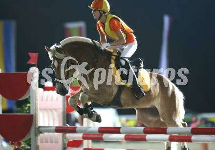 Reitsport. Reiten. Internationale Reitsporttage Maria Woerth. Guiness Weltrekordversuch. Haflinger Weltrekordspringen. 161 cm. Nicole Stangl (AUT). Maria Woerth, am 27.6.2009.
Foto: Kuess
---
pressefotos, pressefotografie, kuess, qs, qspictures, sport, bild, bilder, bilddatenbank