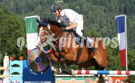 Reitsport. Reiten. Internationale Reitsporttage Maria Woerth. Christian Knoll (AUT) auf Leandrino. Maria Woerth, am 27.6.2009.
Foto: Kuess
---
pressefotos, pressefotografie, kuess, qs, qspictures, sport, bild, bilder, bilddatenbank