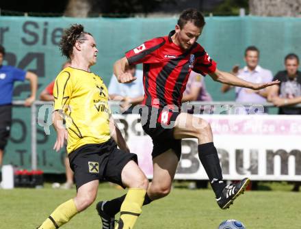 Fussball. Villacher Stadtpokal. Magdalener SC gegen Admira Villach. Mario Svete (Magdalener SC), Jasmin Keric (Admira). Landskron, am 11.7.2009.
Foto: Kuess
---
pressefotos, pressefotografie, kuess, qs, qspictures, sport, bild, bilder, bilddatenbank