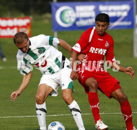 Fussball. Deutsche Bundesliga. Testspiel. Hannover 96 gegen 1. FC Koeln.
Konstantin Rausch (Hannover), Adil Chihi (Koeln). Bad Kleinkirchheim, 16.7.2009.
Foto: Kuess
---
pressefotos, pressefotografie, kuess, qs, qspictures, sport, bild, bilder, bilddatenbank