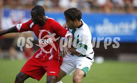 Fussball. Deutsche Bundesliga. Testspiel. Hannover 96 gegen 1. FC Koeln.
Karim Haggui (Hannover), Ishiaku Manasseh (Koeln). Bad Kleinkirchheim, 16.7.2009.
Foto: Kuess
---
pressefotos, pressefotografie, kuess, qs, qspictures, sport, bild, bilder, bilddatenbank