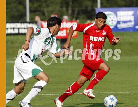 Fussball. Deutsche Bundesliga. Testspiel. Hannover 96 gegen 1. FC Koeln.
Karim Haggui (Hannover), Adil Chihi (Koeln). Bad Kleinkirchheim, 16.7.2009.
Foto: Kuess
---
pressefotos, pressefotografie, kuess, qs, qspictures, sport, bild, bilder, bilddatenbank