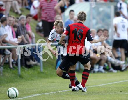 Fussball. Testspiel. SK Austria Kaernten gegen Eintracht Frankfurt. Thomas Hinum (Austria Kaernten), Christoph Spycher (Frankfurt). Hermagor, 20.7.2009.
Foto: Kuess
---
pressefotos, pressefotografie, kuess, qs, qspictures, sport, bild, bilder, bilddatenbank