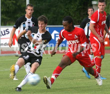 Fussball Testspiel. WAC/St. Andrae gegen 1. FC Koeln. Christian Falk (WAC), Yabo Ray (Koeln). Wolfsberg, am 22.7.2009.
Foto: Kuess
---
pressefotos, pressefotografie, kuess, qs, qspictures, sport, bild, bilder, bilddatenbank