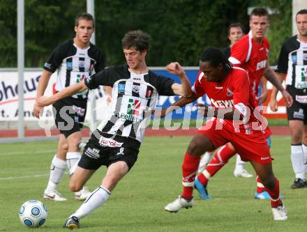 Fussball Testspiel. WAC/St. Andrae gegen 1. FC Koeln. Christian Falk (WAC), Yabo Ray (Koeln). Wolfsberg, am 22.7.2009.
Foto: Kuess
---
pressefotos, pressefotografie, kuess, qs, qspictures, sport, bild, bilder, bilddatenbank