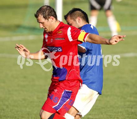 Fussball KFV Cup. ASKOE Koettmannsdorf gegen SAK. Oezdemir Galip (Koettmannsdorf), Christian Dlopst (SAK). Koettmannsdorf, am 24.7.2009.
Foto: Kuess
---
pressefotos, pressefotografie, kuess, qs, qspictures, sport, bild, bilder, bilddatenbank