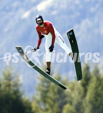 Wasserski. Springen. Claudio Koestenberger. Lendorf, 26.7.2009.
Foto: Kuess
---
pressefotos, pressefotografie, kuess, qs, qspictures, sport, bild, bilder, bilddatenbank