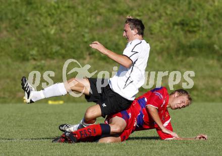 Fussball. OEFB Cup. Austria Kaernten Amateure gegen SAK. Manuel Kollmann (Austria), Samo Bernhard Olip (SAK). Poggersdorf, am 27.7.2009.
Foto: Kuess
---
pressefotos, pressefotografie, kuess, qs, qspictures, sport, bild, bilder, bilddatenbank