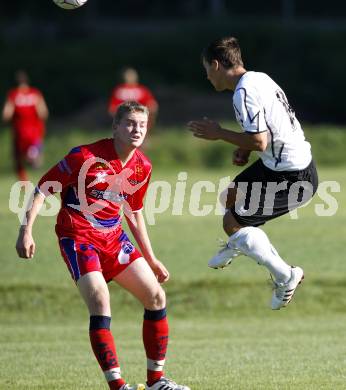 Fussball. OEFB Cup. Austria Kaernten Amateure gegen SAK. Martin Salentinig (Austria), Matija Smrtnik (SAK). Poggersdorf, am 27.7.2009.
Foto: Kuess
---
pressefotos, pressefotografie, kuess, qs, qspictures, sport, bild, bilder, bilddatenbank