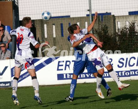 Fussball. Regionalliga. SAK gegen St. Veit.  Smrtnik Matija, Dlopst Christian (SAK), Rebernig Michael (St.Veit). Klagenfurt, 7.8.2009. 
Foto: Kuess

---
pressefotos, pressefotografie, kuess, qs, qspictures, sport, bild, bilder, bilddatenbank